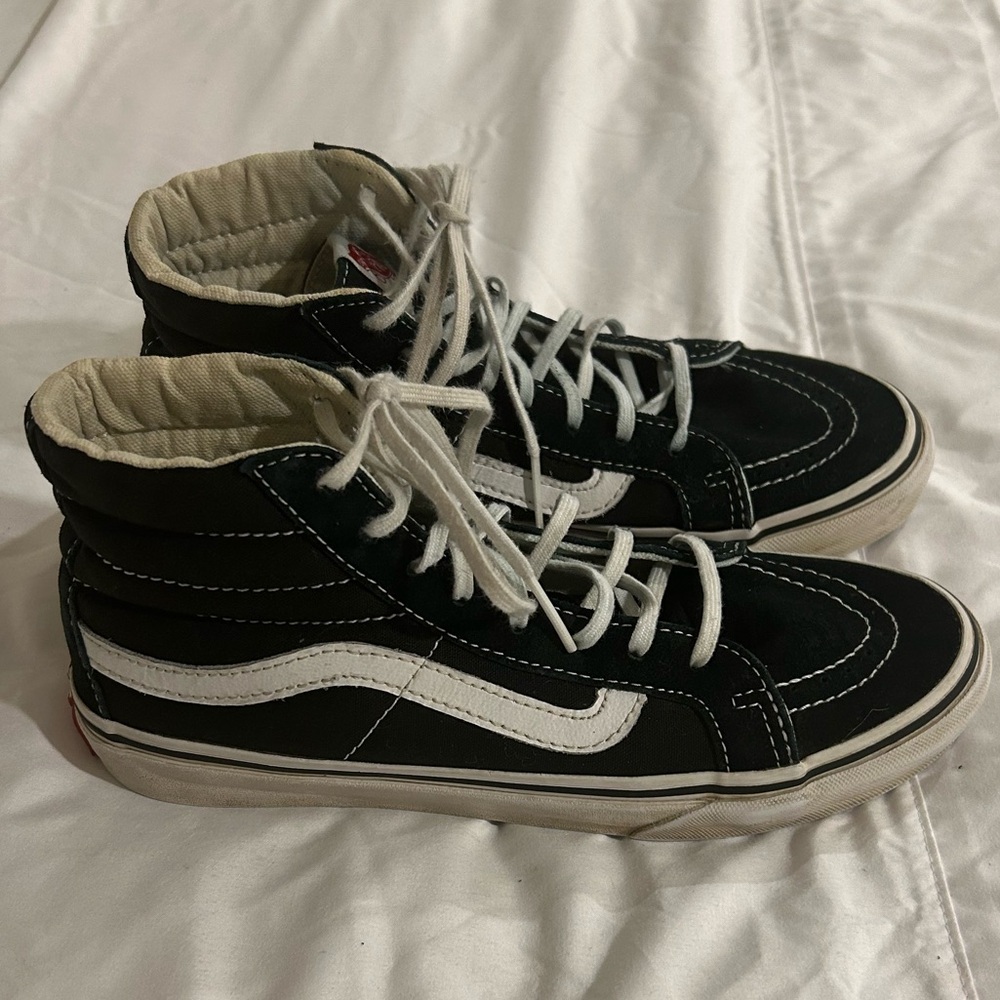 Vans mens size 6 women’s size 7.5 black high top sneakers.